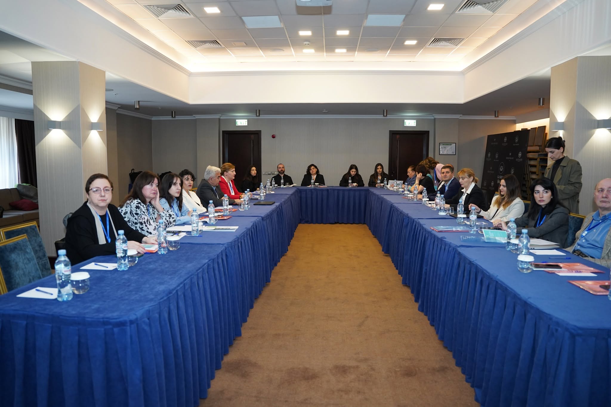 Researchers and participants seated together during the congress